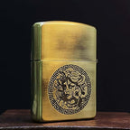 Side profile view of Medusa engraved vintage brass pocket lighter