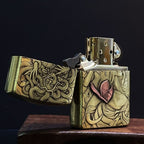 Close‑up shot of intricate Medusa snake‑hair 3D carving on brass lighter