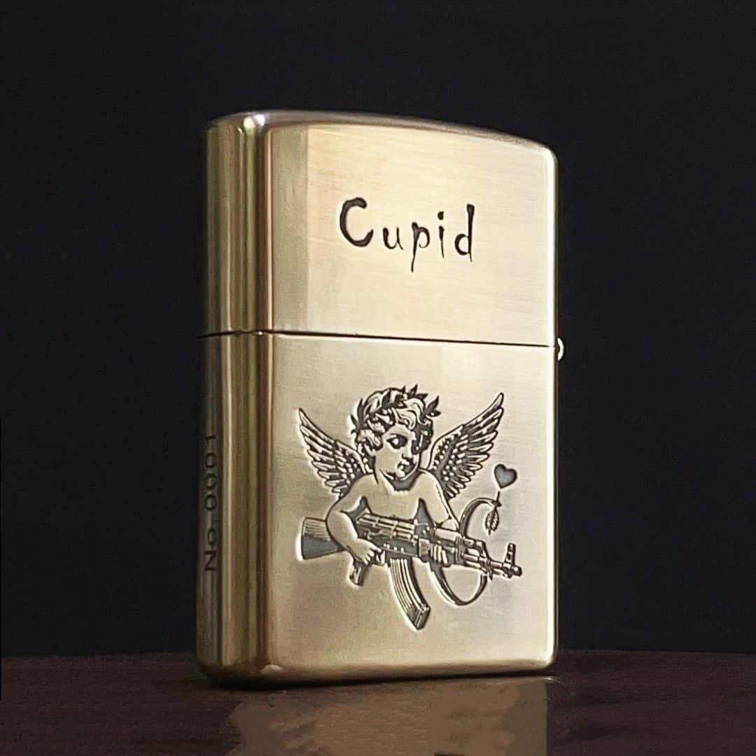 Reverse side view, tactical cupid engraving on solid brass lighter